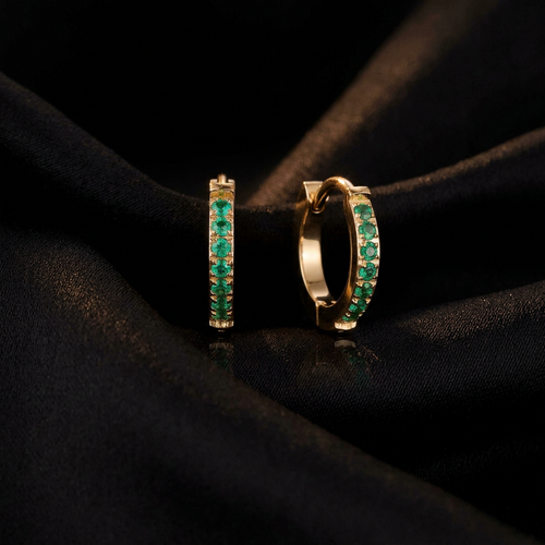 Emerald Energy Huggies styled on black silk