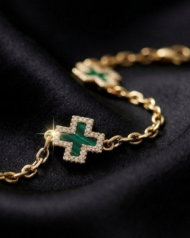 The Emerald Bracelet on black satin